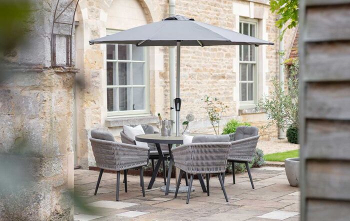 Bramblecrest Mauritius Round 4 Seat Dining Set with Parasol & Base