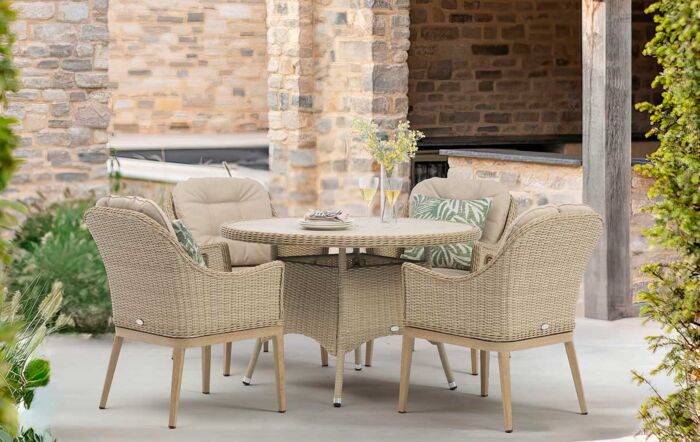 Bramblecrest Monterey Sandstone 120cm Round Dining Table & 4 Deluxe Vogue Armchairs, Parasol & Base 