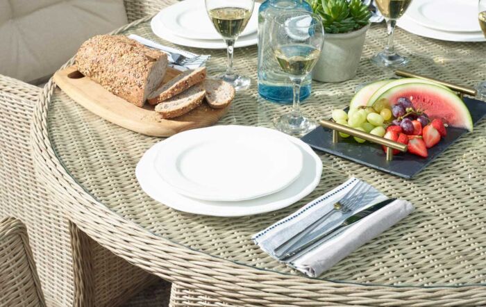 Bramblecrest Monterey 6 Seater Round Sandstone Dining Set - Includes Lazy Susan Parasol & Base