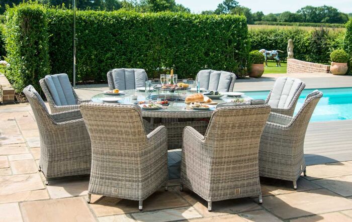 Maze Oxford Round 8 Seat Dining Set with Venice Chairs, firepit and Lazy Susan.