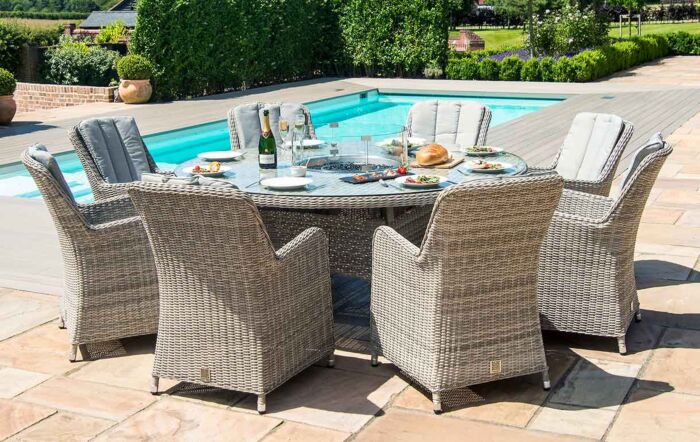 Maze Oxford Round 8 Seat Dining Set with Venice Chairs, firepit and Lazy Susan.